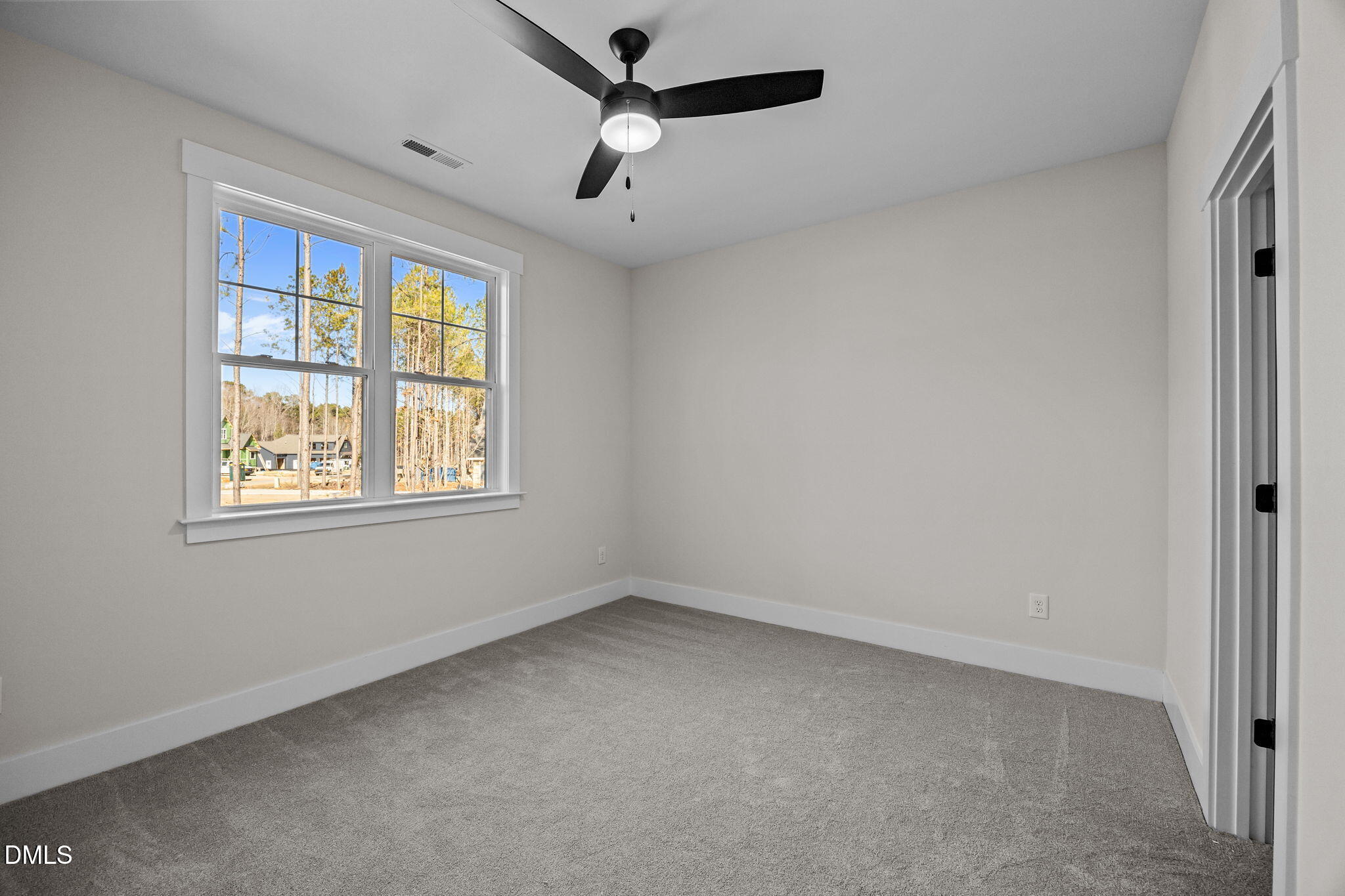 357 Slocum Drive Wendell, NC 27591 - Photo 35 of 48 wooden floor in an empty room with a window