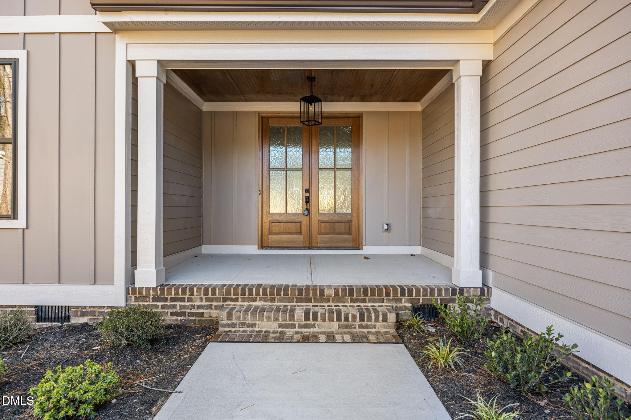 357 Slocum Drive Wendell, NC 27591 - Photo 4 of 48 a front view of a house with a garden