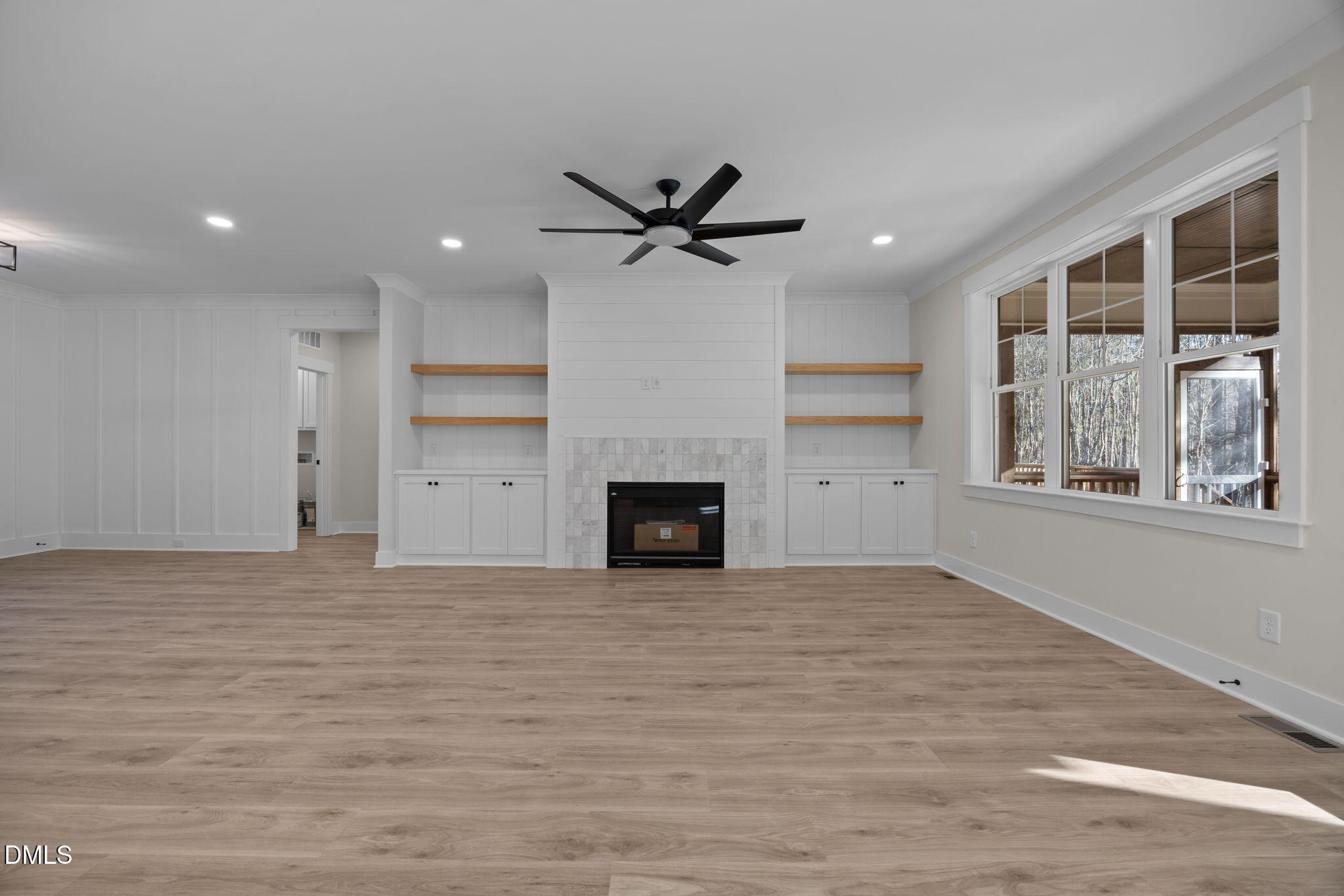 357 Slocum Drive Wendell, NC 27591 - Photo 9 of 48 a view of a room with a ceiling fan ceiling fan and window