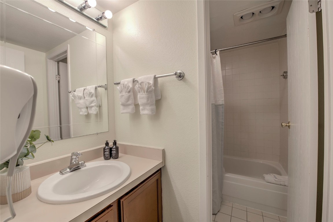 1977 Soda Ridge Road, Unit 1199 Keystone, CO 80435 - Photo 16 of 35 a bathroom with a sink toilet and shower