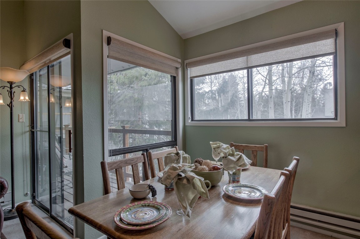 1977 Soda Ridge Road, Unit 1199 Keystone, CO 80435 - Photo 7 of 35 a dining room with furniture window and outdoor view