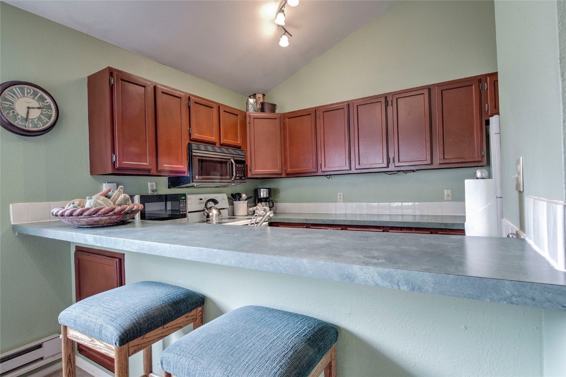 1977 Soda Ridge Road, Unit 1199 Keystone, CO 80435 - Photo 9 of 35 a kitchen with a cabinets and appliances