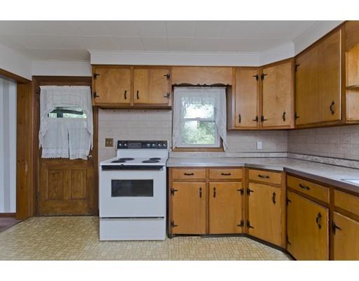 2029 Quaboag Street Three Rivers, MA 01080 - Photo 11 of 42 a kitchen with stainless steel appliances granite countertop a stove a sink and a microwave