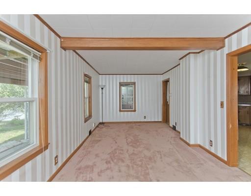 2029 Quaboag Street Three Rivers, MA 01080 - Photo 16 of 42 a view interior of a house with wooden floor and windows