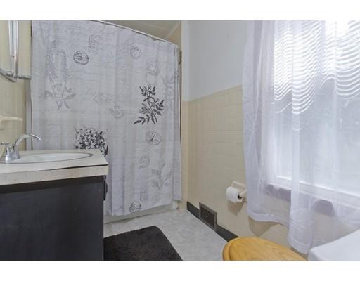 2029 Quaboag Street Three Rivers, MA 01080 - Photo 24 of 42 a bathroom with a sink and a mirror