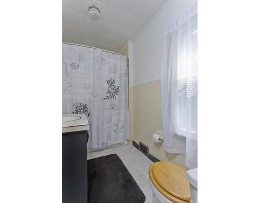 2029 Quaboag Street Three Rivers, MA 01080 - Photo 25 of 42 a bathroom with a sink and a mirror