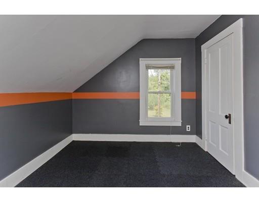 2029 Quaboag Street Three Rivers, MA 01080 - Photo 32 of 42 a view of an empty room with wooden floor and a window