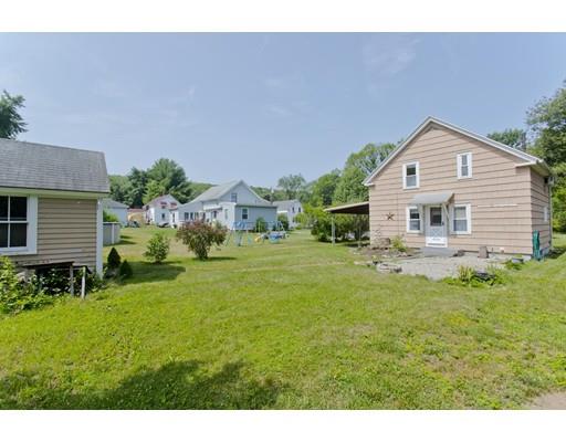 2029 Quaboag Street Three Rivers, MA 01080 - Photo 6 of 42 a aerial view of a house with a yard and sitting area