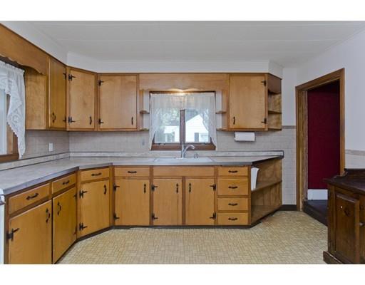 2029 Quaboag Street Three Rivers, MA 01080 - Photo 9 of 42 a kitchen with granite countertop a sink cabinets and stainless steel appliances