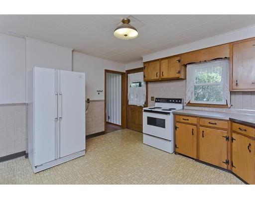 2029 Quaboag Street Three Rivers, MA 01080 - Photo 10 of 42 a kitchen with stainless steel appliances granite countertop a refrigerator and a stove top oven