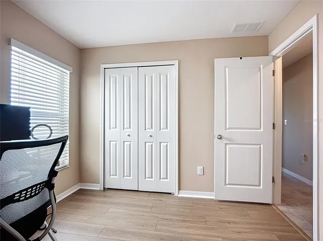 a bathroom with a granite countertop sink toilet a bathtub and shower
