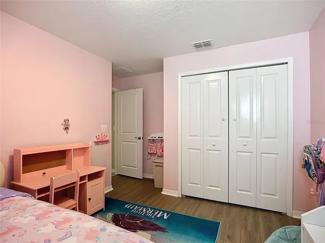 a view of swimming pool from a balcony