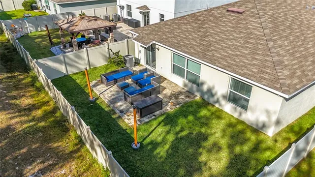 a view of a yard with swimming pool