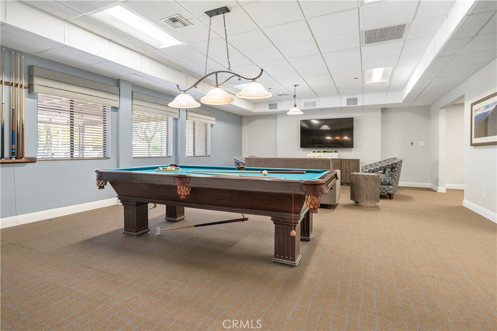 16737 Rickenbacker Circle Riverside, CA 92518 - Photo 17 of 17 a room with pool table and flat screen tv