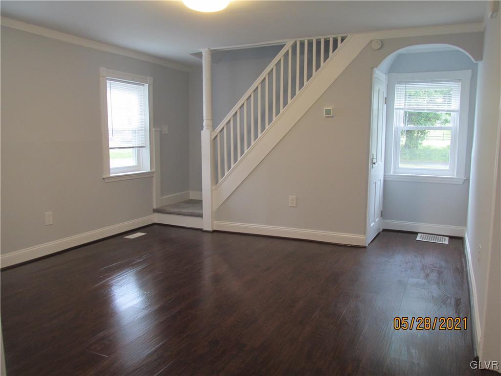 691 Bok Road Nazareth, PA 18064 - Photo 3 of 24 a view of an empty room with wooden floor and a window