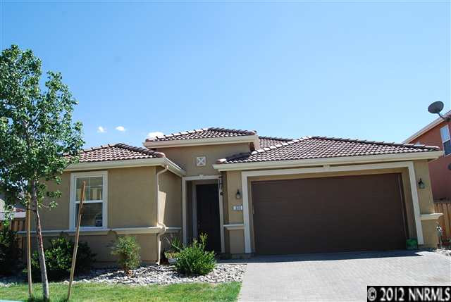 330 Sondrio Way Reno, NV 89521 - Photo 1 of 1 a front view of a house with a garage