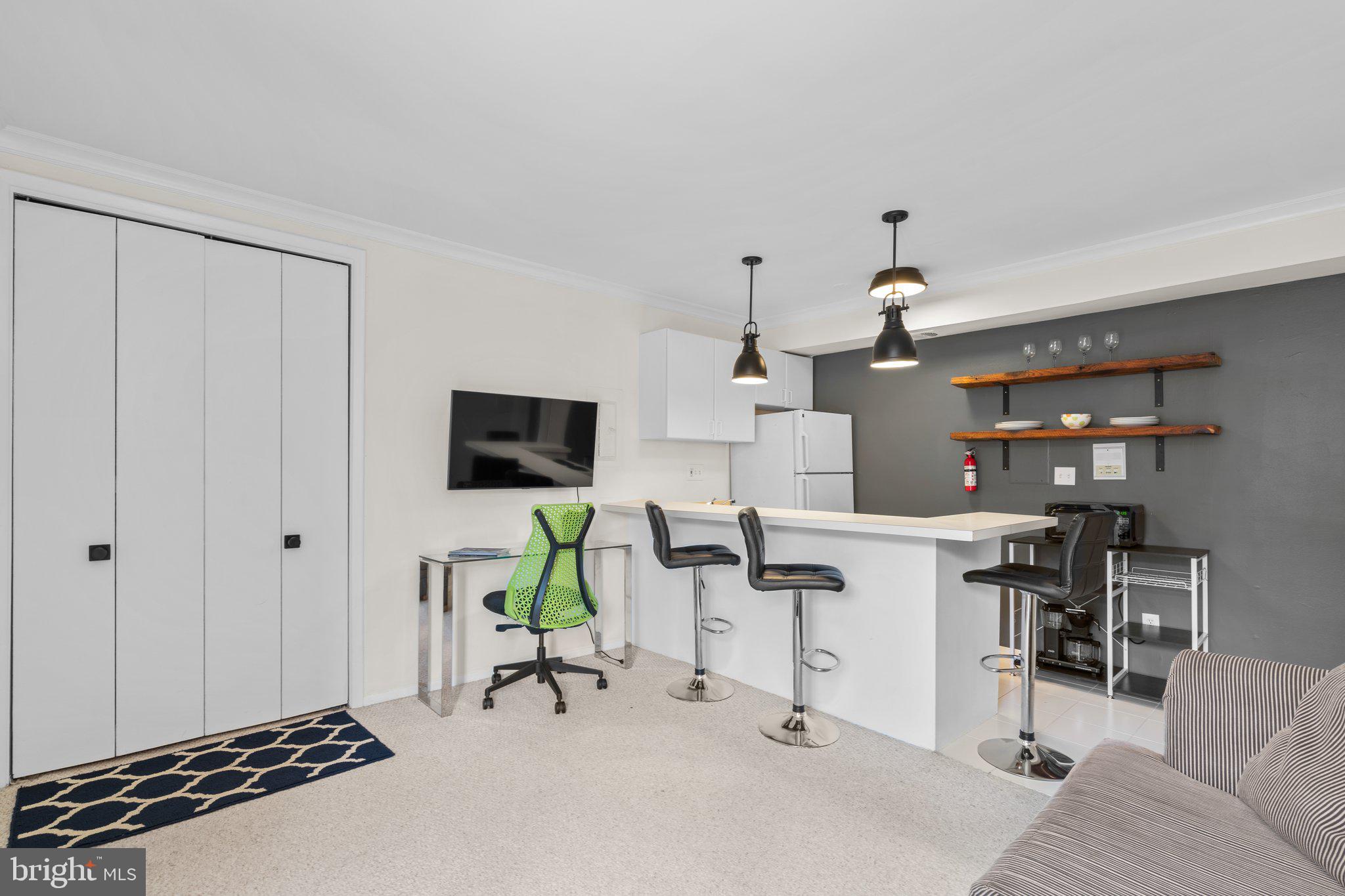 2515 P Street Northwest, Unit 302 Washington, DC 20007 - Photo 9 of 27 a workspace with furniture and a window