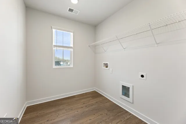 a bathroom with a double vanity sink and shower