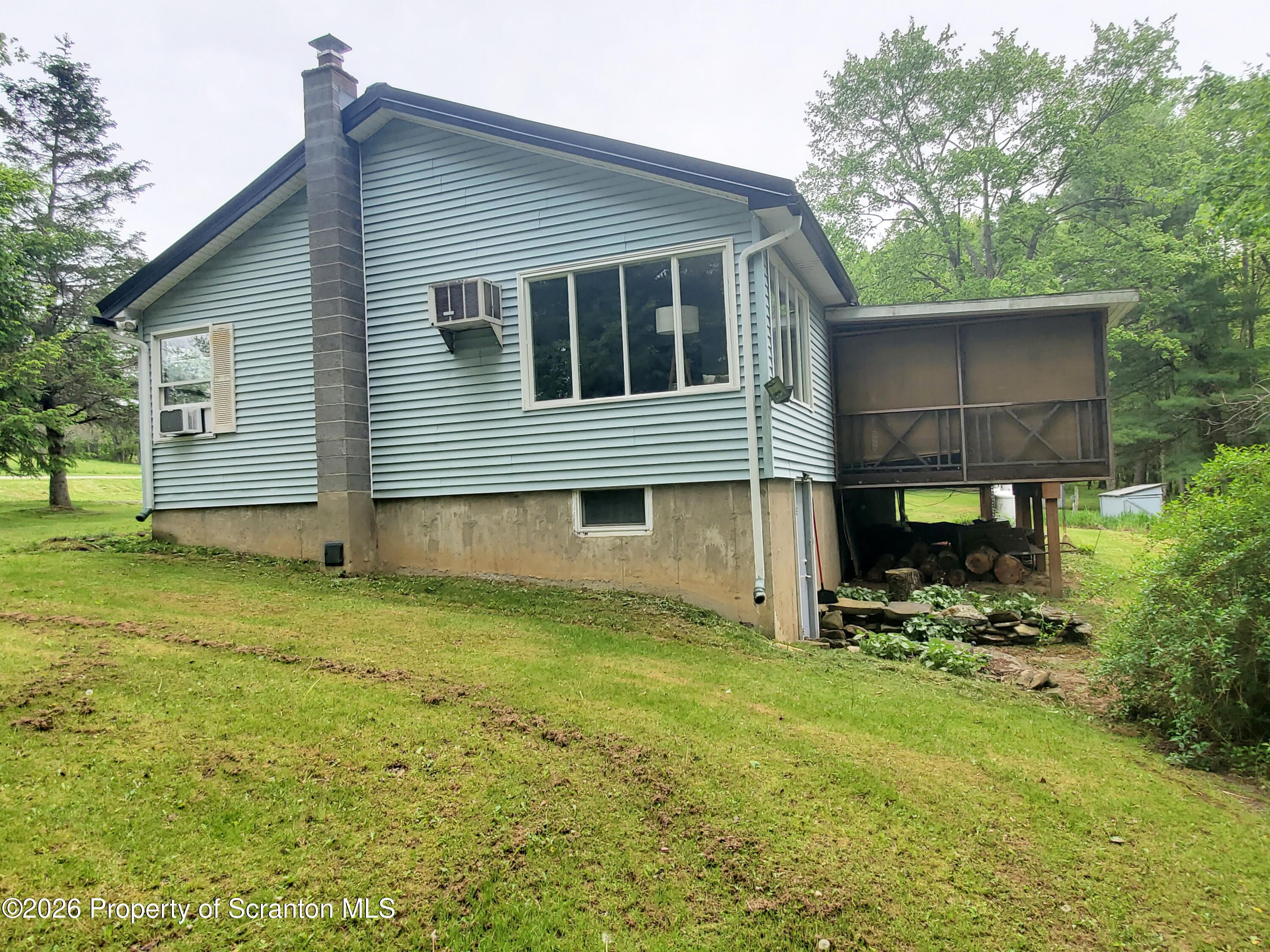 220 Brinkman Road Brackney, PA 18812 - Photo 5 of 32 a view of a house with a yard