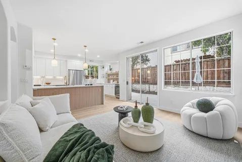 a kitchen with a stove and a sink