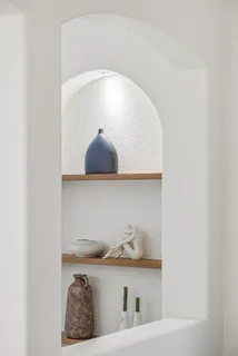 a view of staircase with white walls