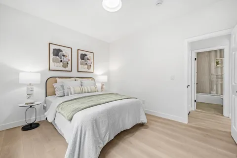 a bathroom with a bathtub and shower