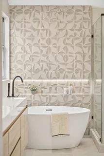 a view of a patio with table and chairs with wooden fence and plants