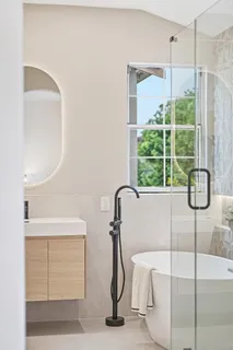 a view of backyard with a patio and outdoor seating