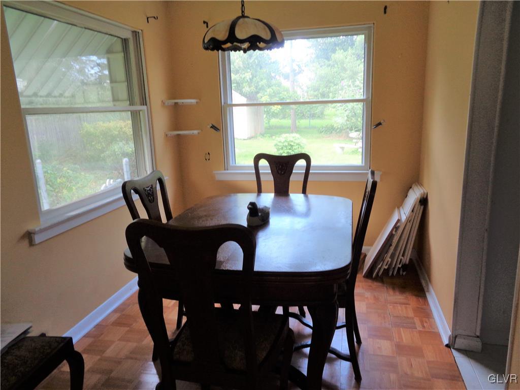 2919 Middletown Road Bethlehem, PA 18020 - Photo 11 of 23 a view of a dining room with furniture a rug and wooden floor
