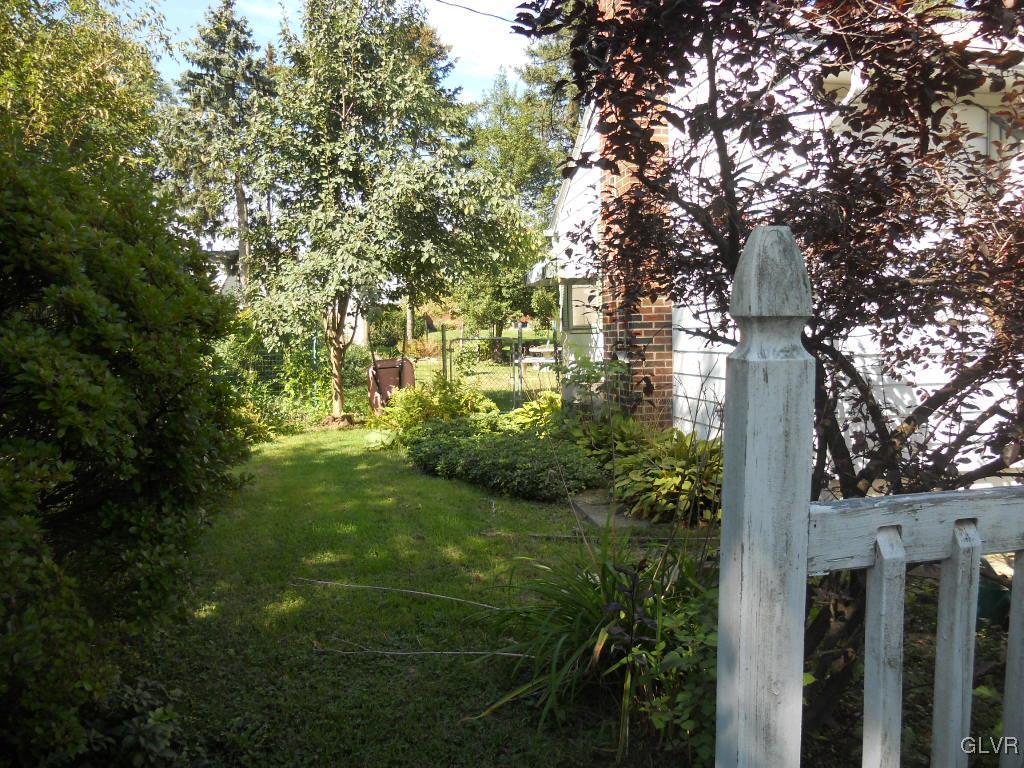 2919 Middletown Road Bethlehem, PA 18020 - Photo 2 of 23 a backyard of a building with trees