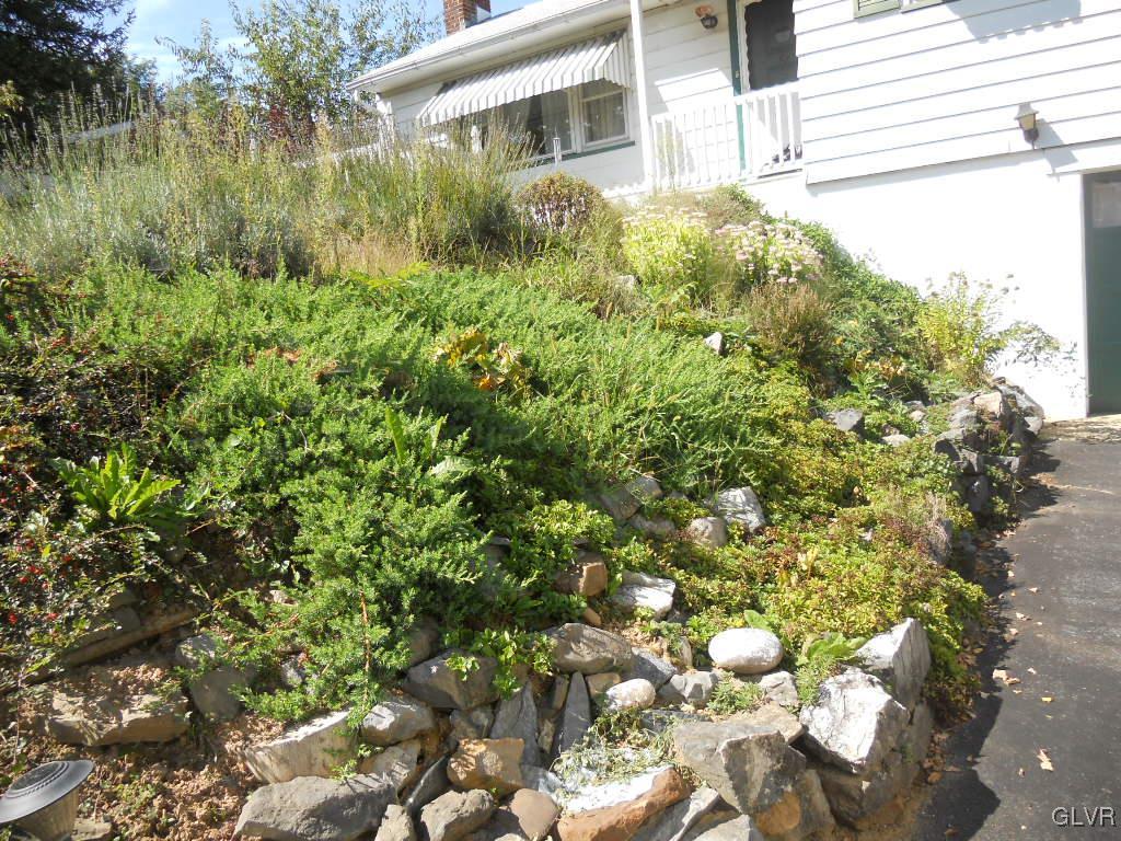 2919 Middletown Road Bethlehem, PA 18020 - Photo 23 of 23 a backyard of a house with lots of green space and outdoor seating