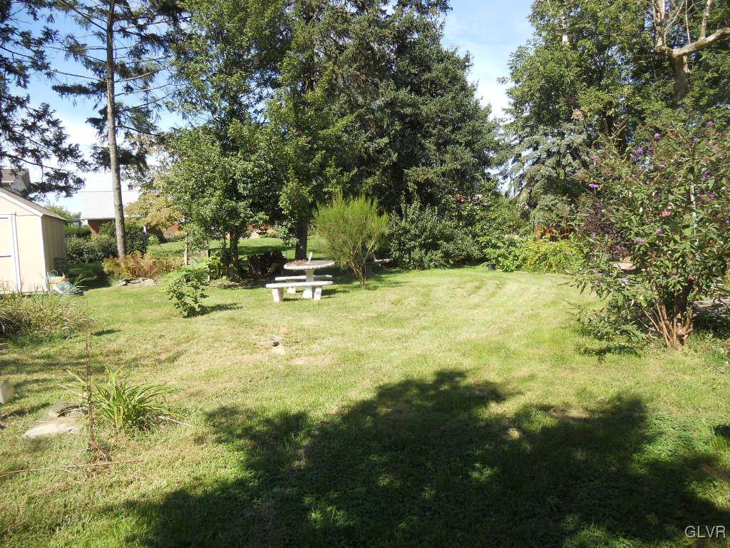 2919 Middletown Road Bethlehem, PA 18020 - Photo 3 of 23 a backyard of a house with table and chairs