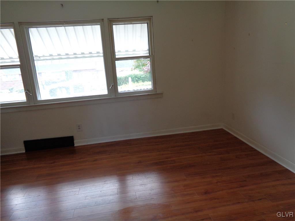 2919 Middletown Road Bethlehem, PA 18020 - Photo 10 of 23 a view of an empty room with wooden floor and a window
