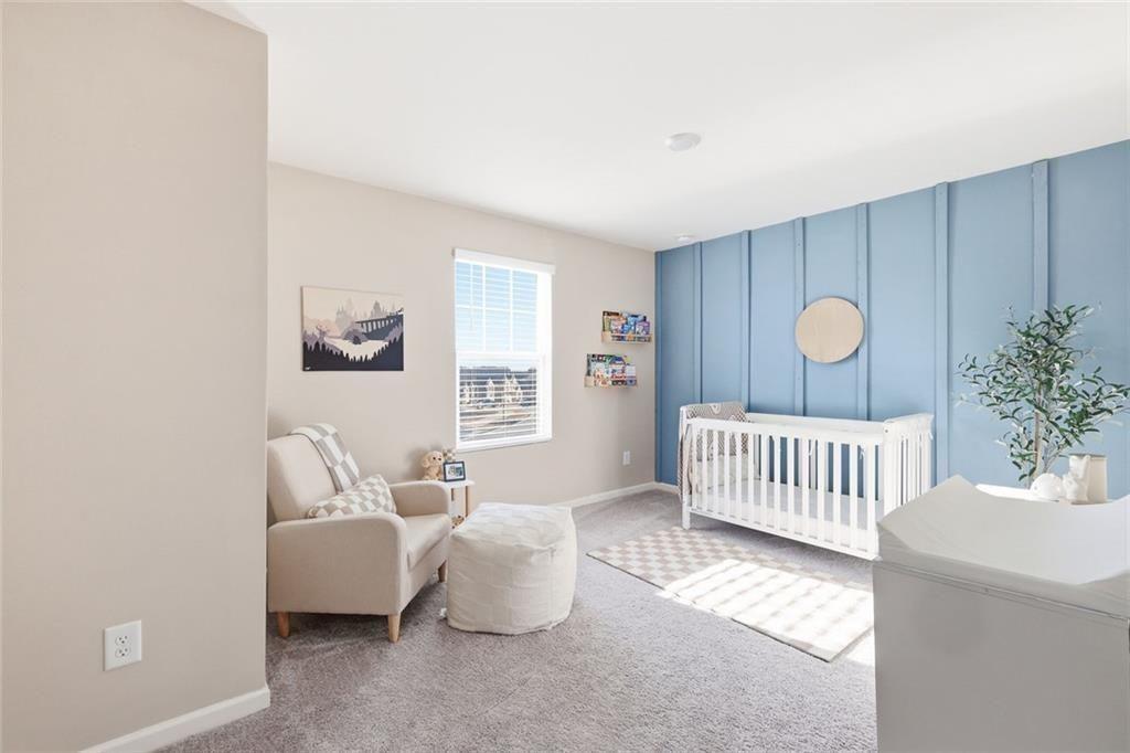 628 Knightsbridge Lane Winder, GA 30680 - Photo 26 of 42 a living room with furniture and a window