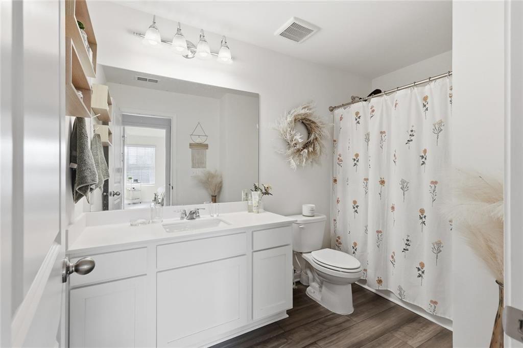 628 Knightsbridge Lane Winder, GA 30680 - Photo 30 of 42 a view of bathroom with a sink toilet and shower