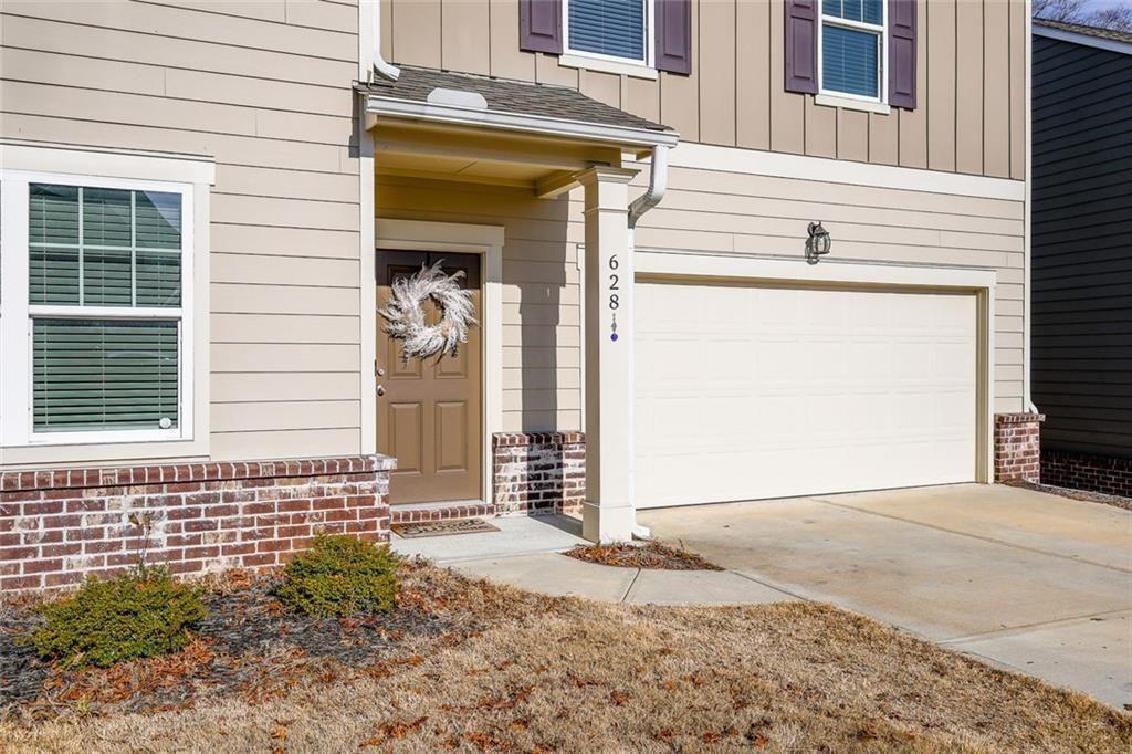 628 Knightsbridge Lane Winder, GA 30680 - Photo 3 of 42 a view of a house with a outdoor space