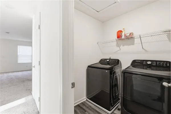 a kitchen with stainless steel appliances granite countertop a stove and a refrigerator