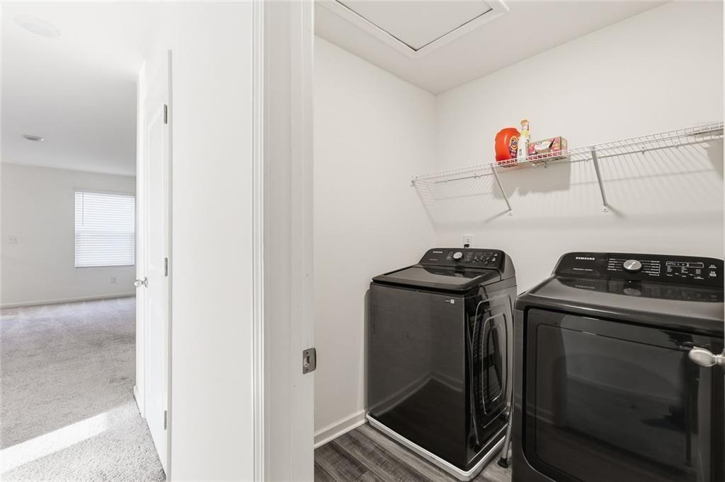 628 Knightsbridge Lane Winder, GA 30680 - Photo 32 of 42 a kitchen with stainless steel appliances granite countertop a stove and a refrigerator
