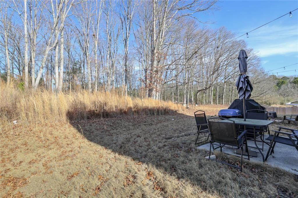 628 Knightsbridge Lane Winder, GA 30680 - Photo 33 of 42 a view of a backyard with sitting area