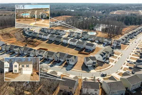 a view of a swimming pool with a patio