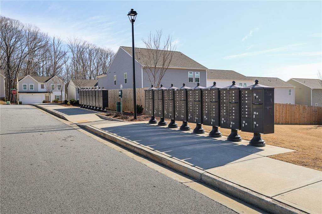 628 Knightsbridge Lane Winder, GA 30680 - Photo 42 of 42 a front view of a building with a street