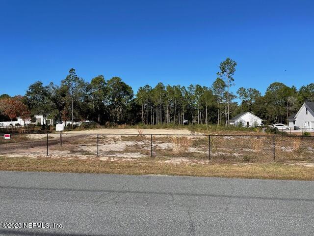 0 Springhill Road Fernandina Beach, FL 32034 - Photo 5 of 7 a view of a swimming pool with a yard