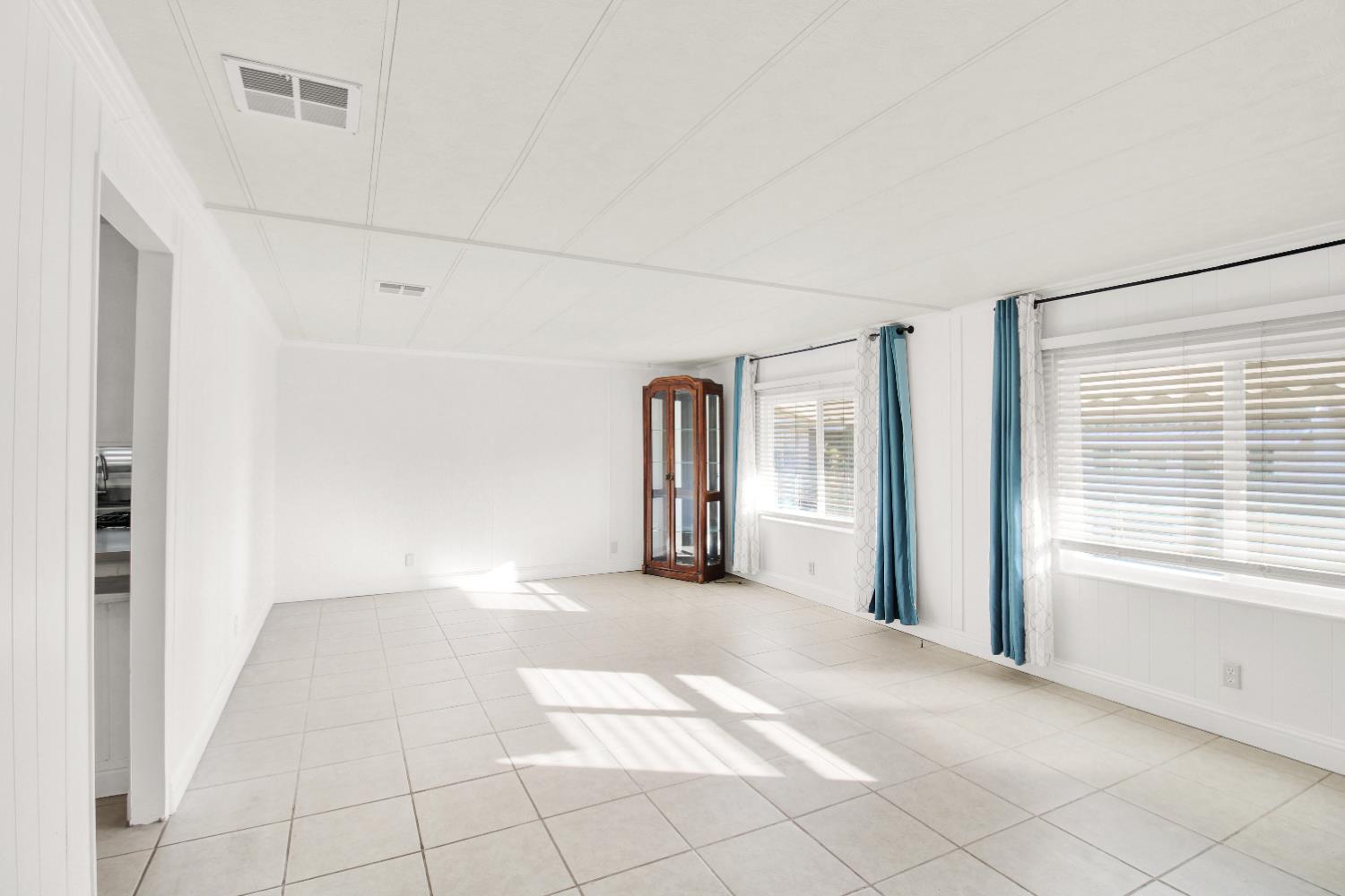 2621 Prescott, Unit 277 Modesto, CA 95350 - Photo 17 of 37 a view of a big room with windows and closet