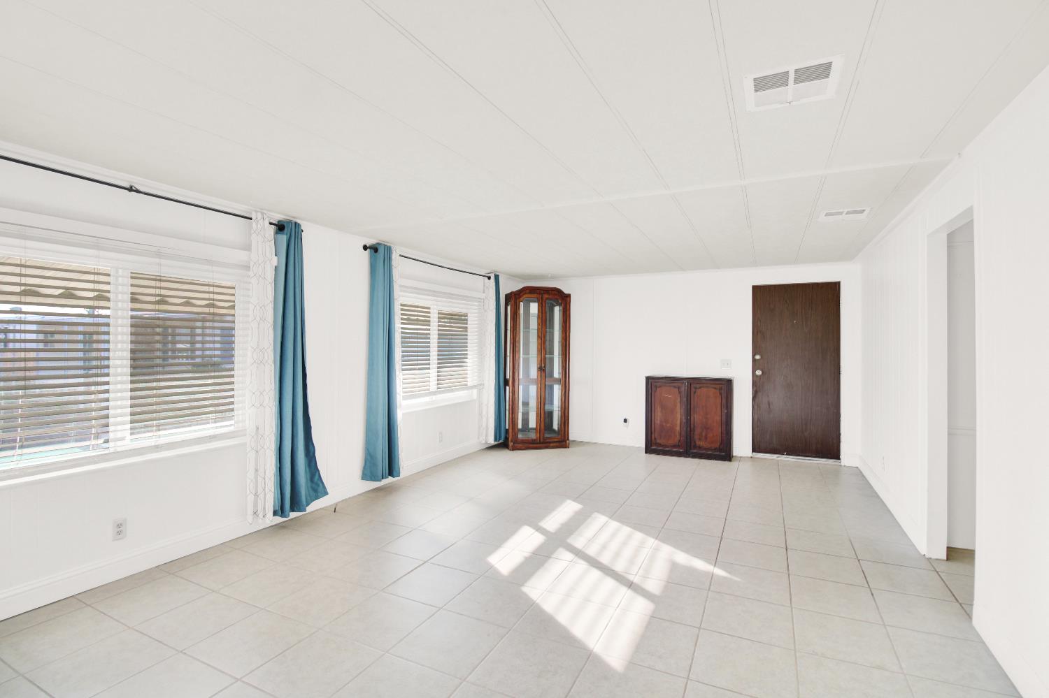 2621 Prescott, Unit 277 Modesto, CA 95350 - Photo 18 of 37 a view of a livingroom with a staircase