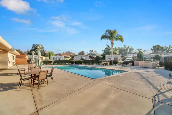 a view of a terrace with sitting area