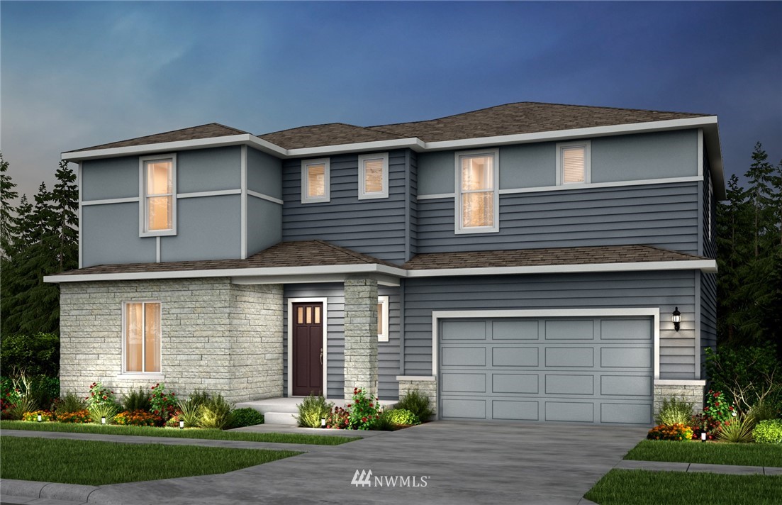 17 215th Street Southeast, Unit 2 Bothell, WA 98021 - Photo 1 of 17 a front view of a house with a yard and garage