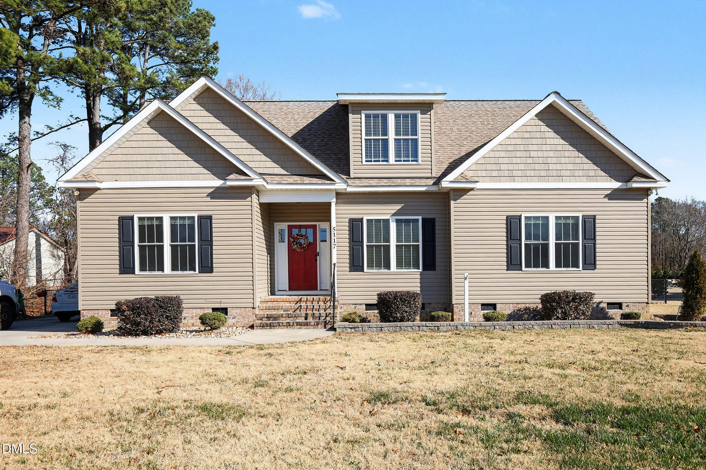 5117 Joe Ellen Road Battleboro, NC 27809 - Photo 2 of 23 a front view of a house with a yard