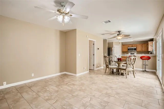 a view of a dining room with furniture