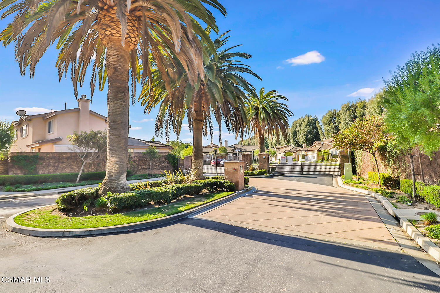 2317 Shakespeare Drive, Unit 9 Oxnard, CA 93033 - Photo 1 of 16 a view of a swimming pool with a garden