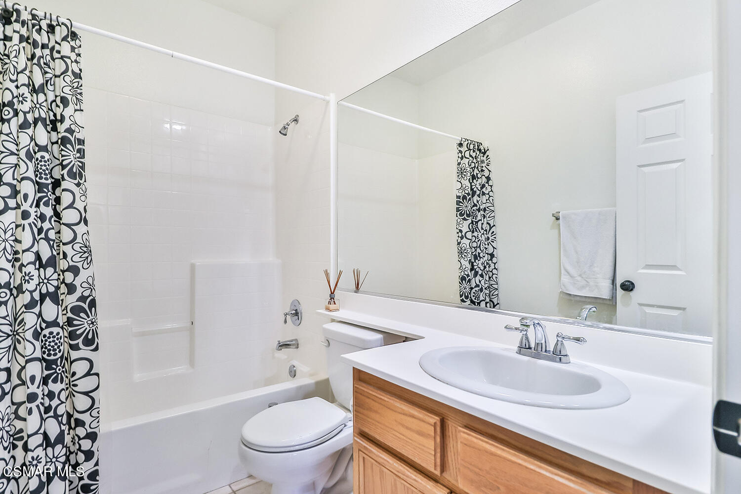 2317 Shakespeare Drive, Unit 9 Oxnard, CA 93033 - Photo 12 of 16 a bathroom with a sink a toilet and shower
